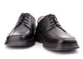 Black glossy manÃ¢â¬â¢s shoes with shoelaces